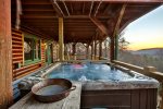 Watch the sunset while relaxing in the hot tub.